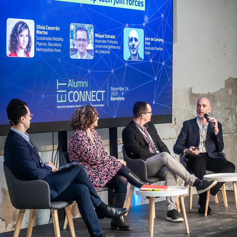 People discussing on a stage